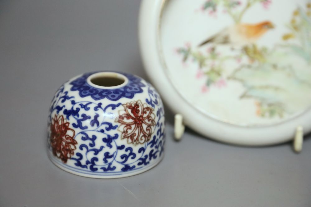 A Chinese porcelain brush holder, diameter 7cm and a Chinese enamelled shallow bowl, paintwork signed, 14cm